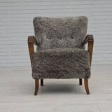 1960s, reupholstered Danish armchair, New Zealand genuine sheepskin.