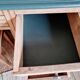 Bureau ancien en bois plateau vert et tiroirs