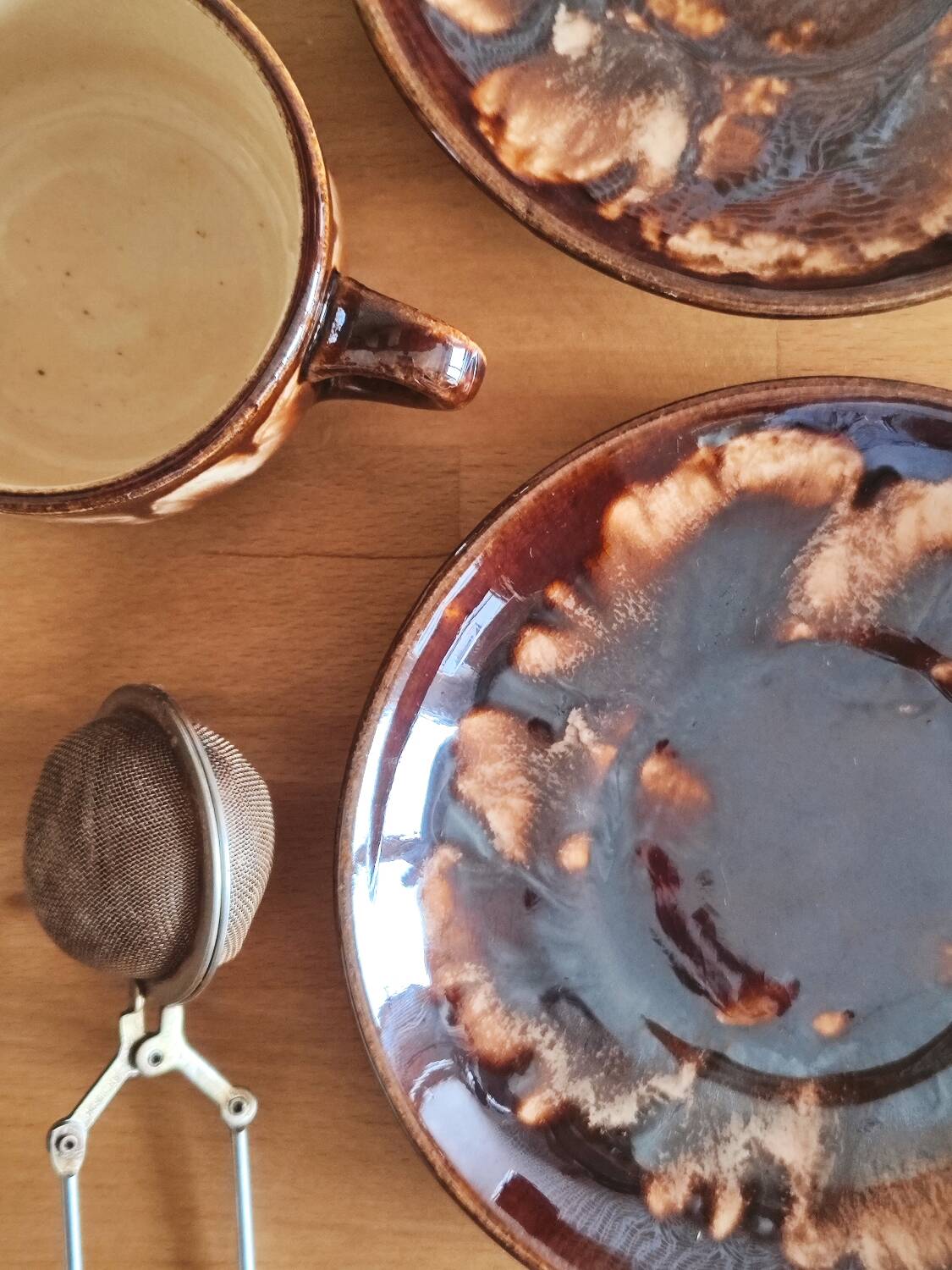 Vintage coffee service in glazed brown ceramic.