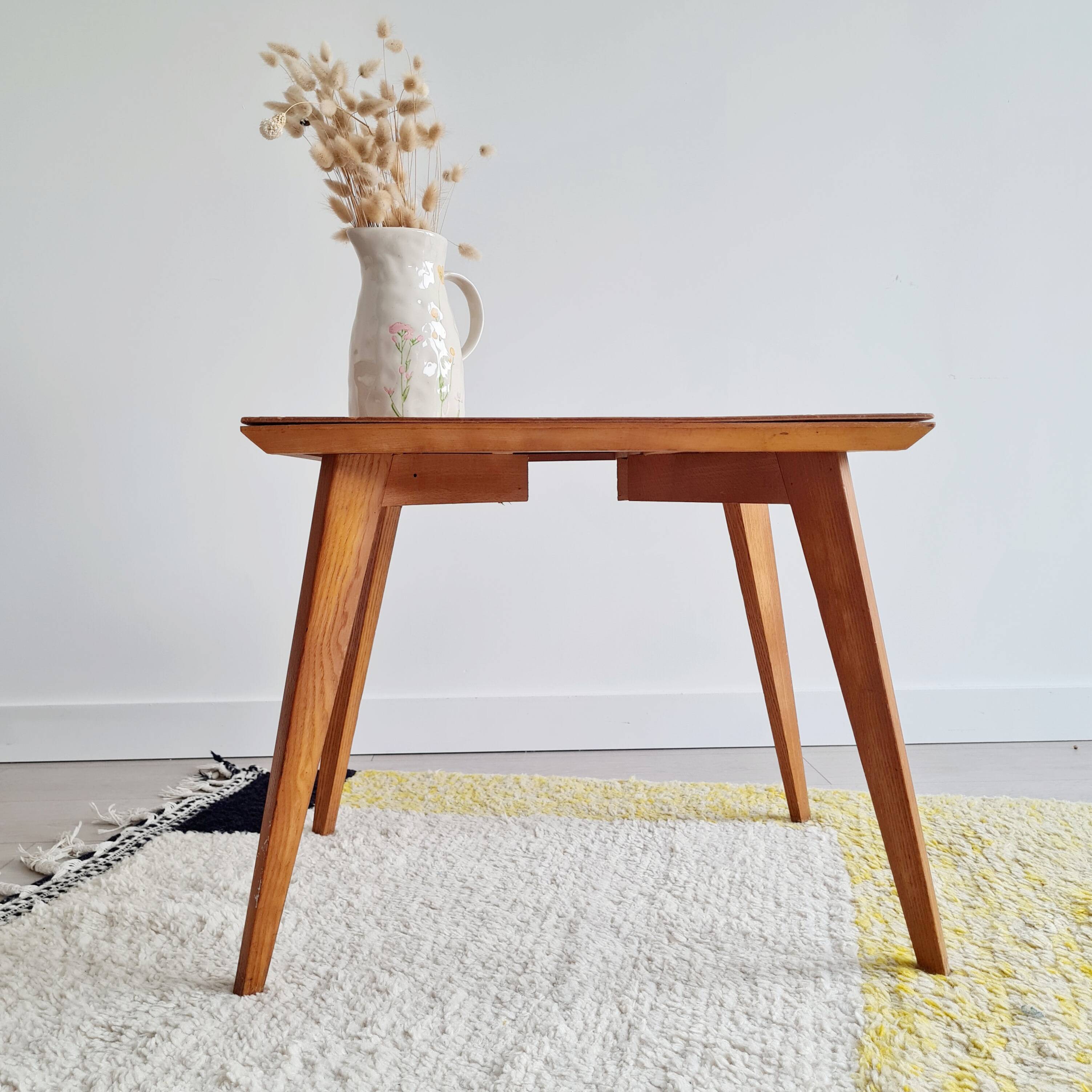 Table basse pieds compas dessus marqueté