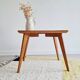 Table basse pieds compas dessus marqueté