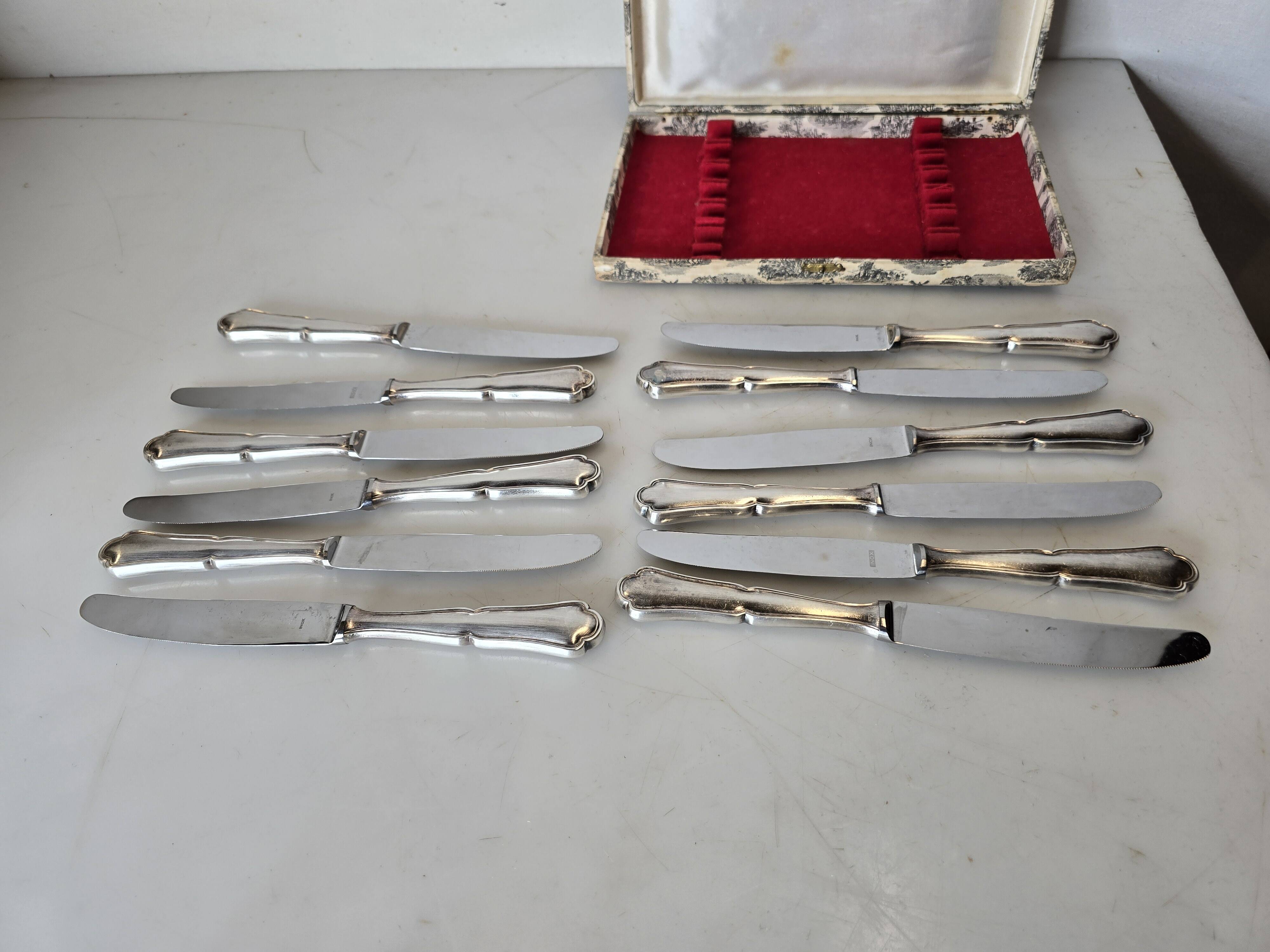 12 silver-plated knives mid-15th century