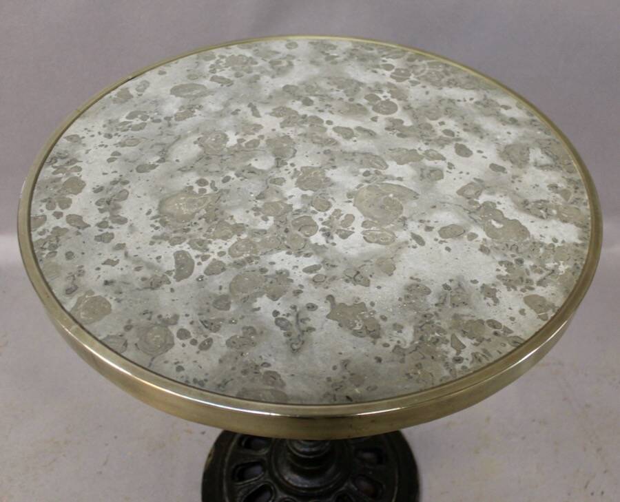 Bistro table with marble top and brass rim