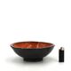 Mexican ceramic catchall in orange and black, 1970s sun face.