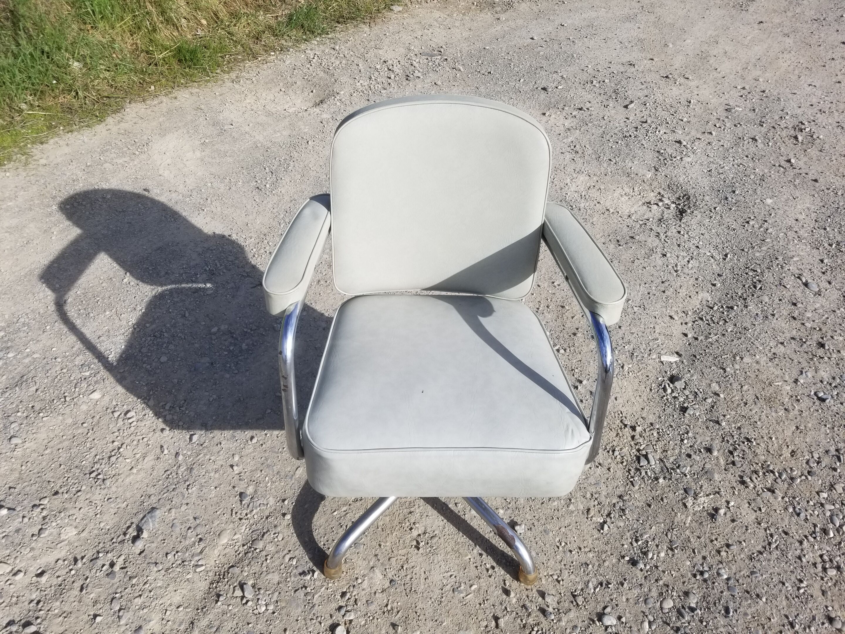 Old light grey pullman swivel office chair