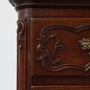French 18th Century hand crafted oak chest of drawers in Louis XV style
