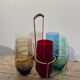 Crystal coloured water glasses in gilded metal glass holders 1970