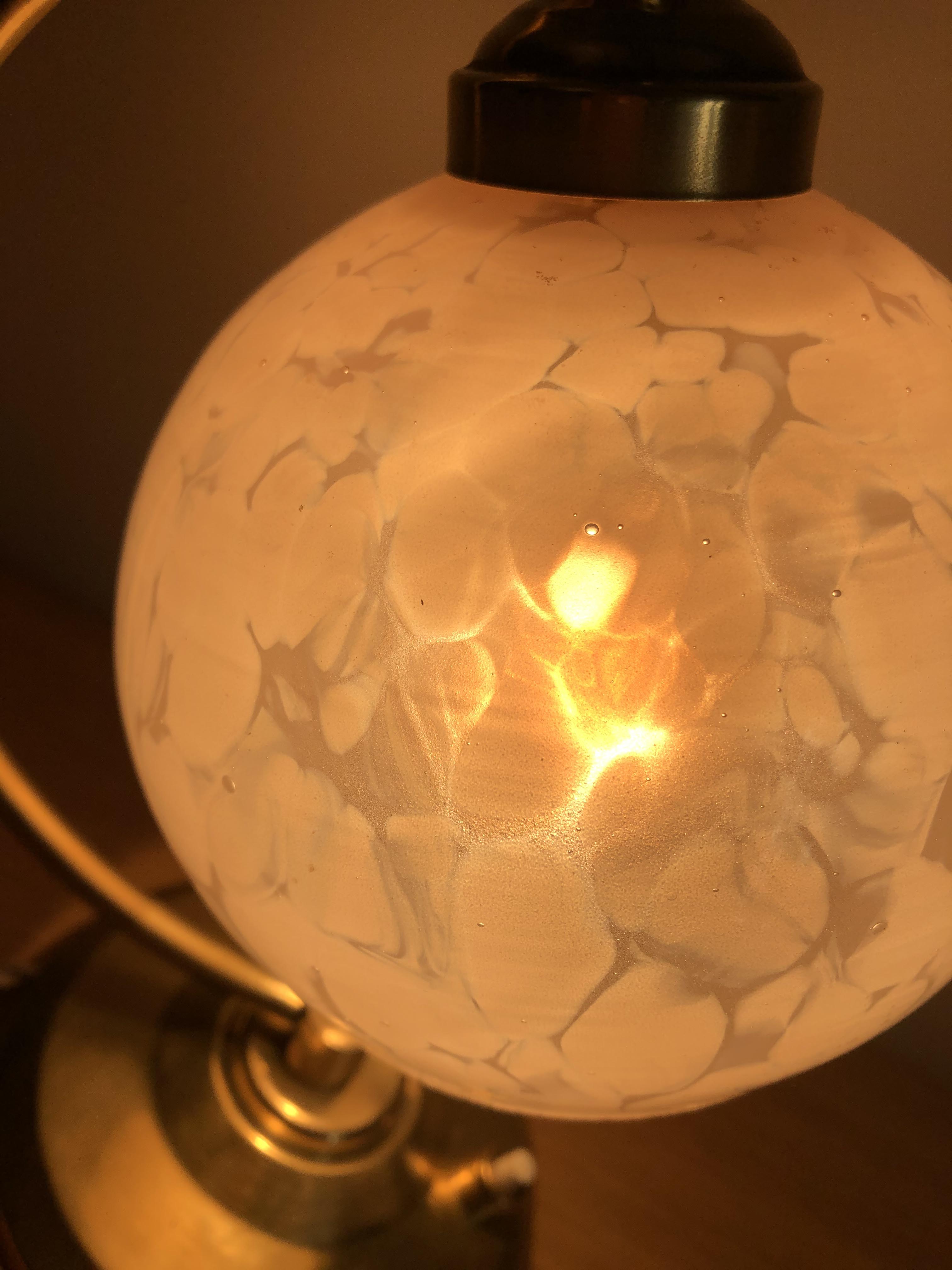 Old articulated bedside lamp
