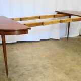 Mahogany round table with 4 extensions from the 1950s