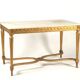 Golden carved wooden centre table with a white marble top.