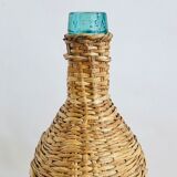 Viresa bottle in glass and wicker
