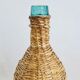 Bouteille Viresa en verre et osier