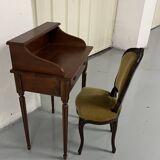 Old-fashioned secretary desk and chair set.