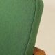 Scandinavian modern chair in green wool, vintage wooden armchair.