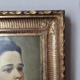 Oil on canvas portrait in an antique gilded wooden frame.