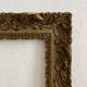Old frame in gilded wood with stucco decoration circa 1900