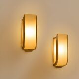 Pair of modernist wall sconces in nickel-plated steel and opaline glass, 1930.
