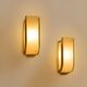Pair of modernist wall sconces in nickel-plated steel and opaline glass, 1930.