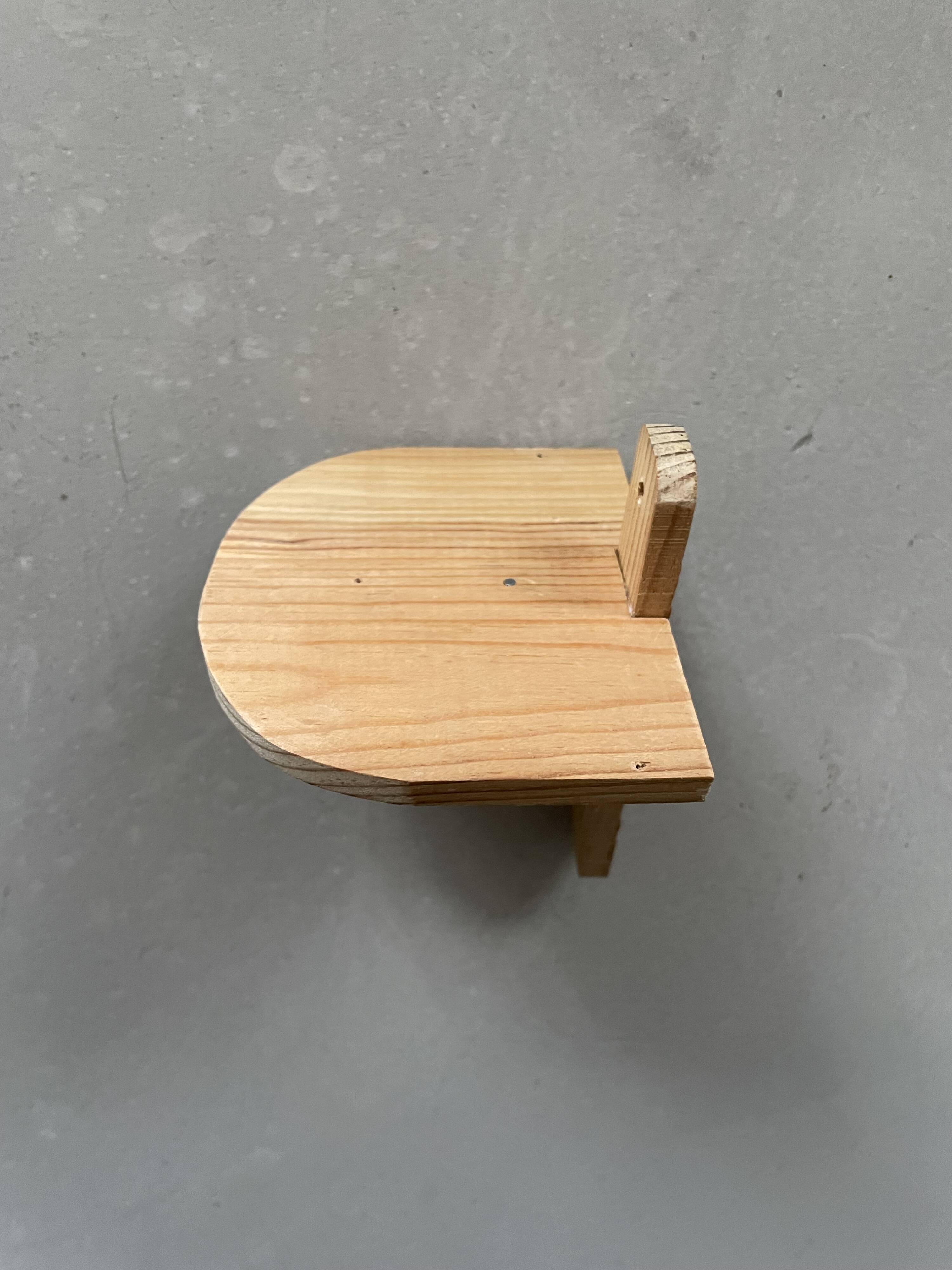 Small wall-mounted wooden shelf