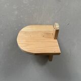 Small wall-mounted wooden shelf