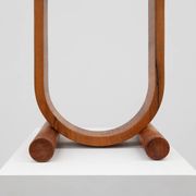 Art deco oak wooden round side table with bended leg, France 1920s