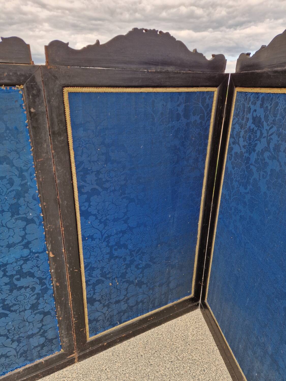 Folding screen in black-painted wood, 19th century