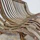 Cast iron garden bench from the late 19th century with slatted backrest.