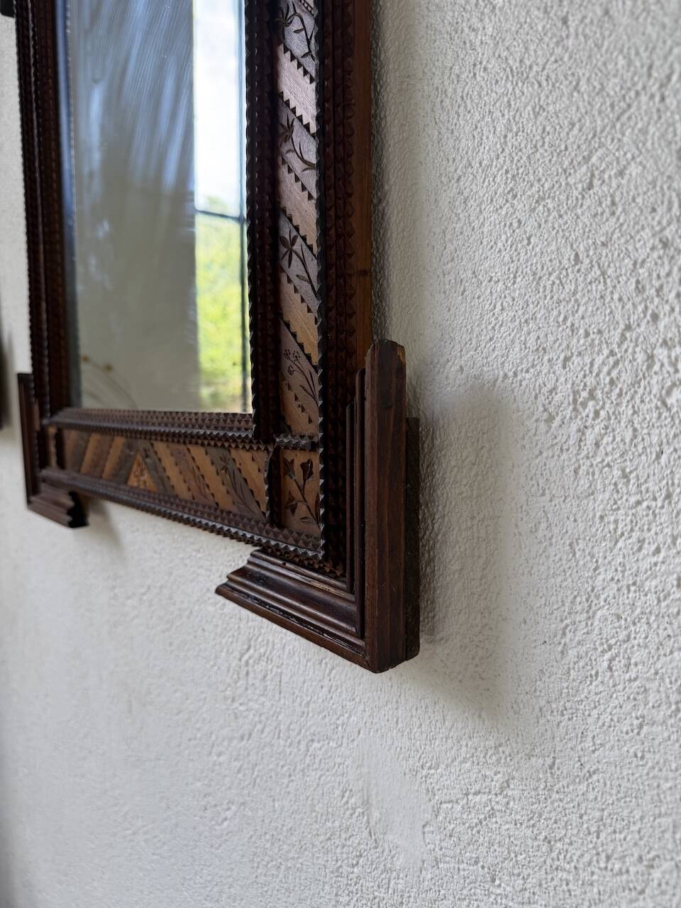 Pair of wooden mirrors in tramp art style