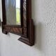 Pair of wooden mirrors in tramp art style