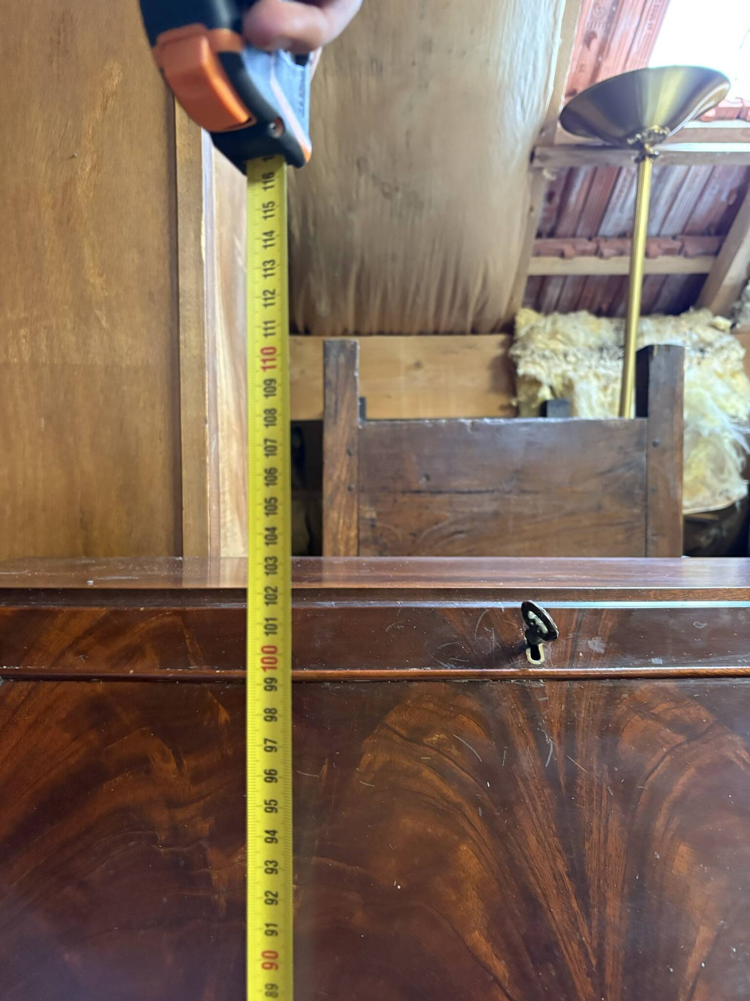 Antique mahogany secretary, upholstered flap and interior storage