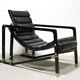 Black leather chaise longue, Eileen Gray design, 1927, France, circa 1975.