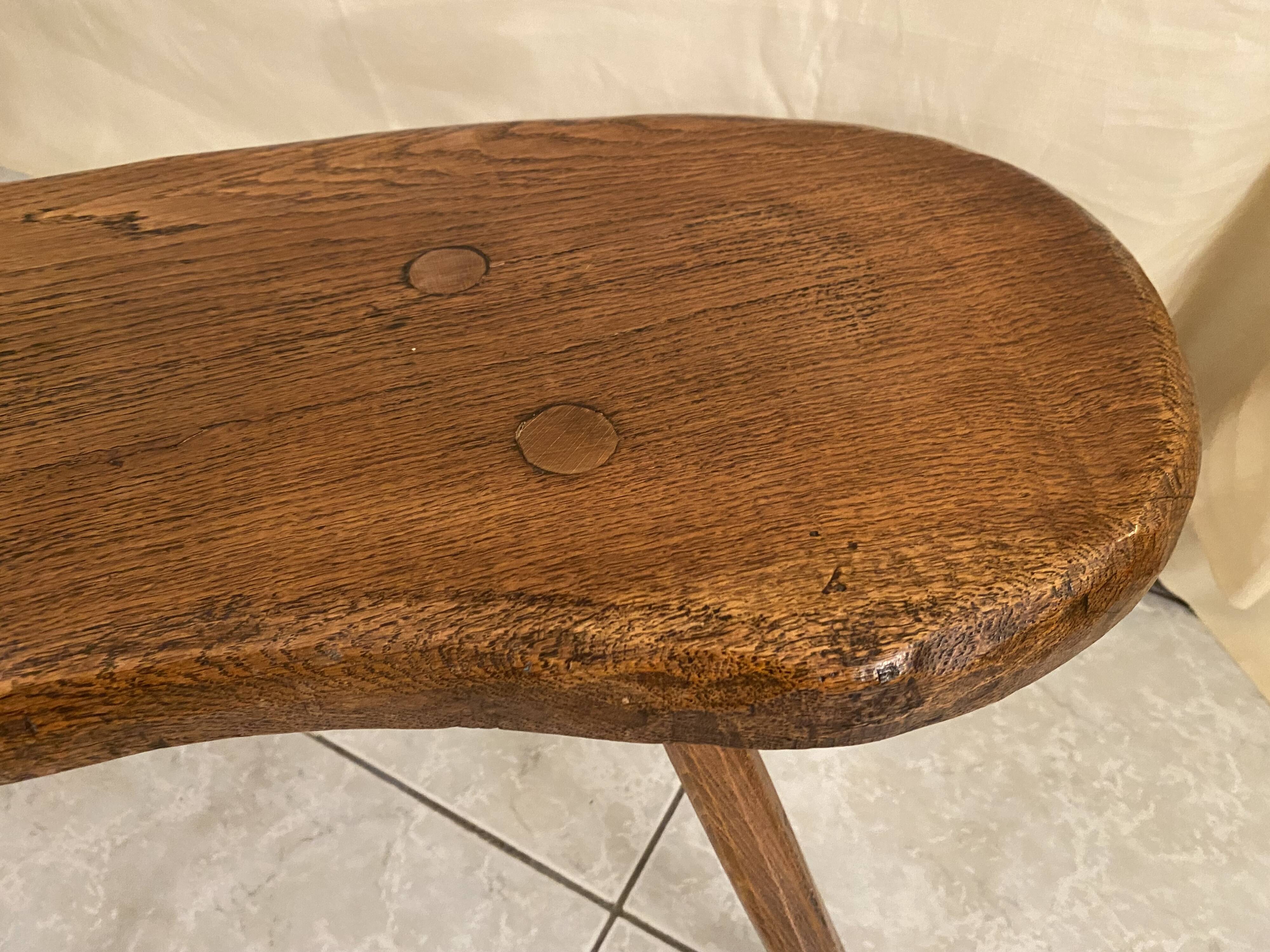 Small brutalist solid wood bench