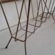 Gold metal newspaper holder