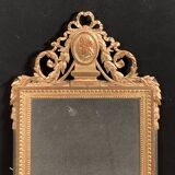Louis XVI style mirror in gilded wood