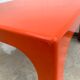 Square orange fiberglass coffee table