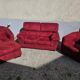 Ensemble un canapé deux fauteuils rouge et un pouf très bon état