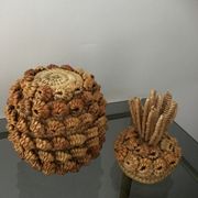 Trash in the form of the pineapple in natural fibers