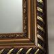Miroir en bois doré 37,5 x 45 cm