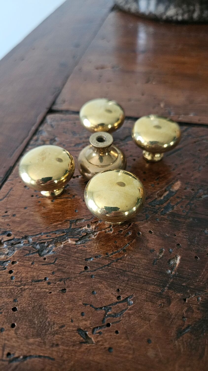 5 polished brass furniture knobs