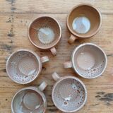 Stoneware coffee service, cups and saucers
