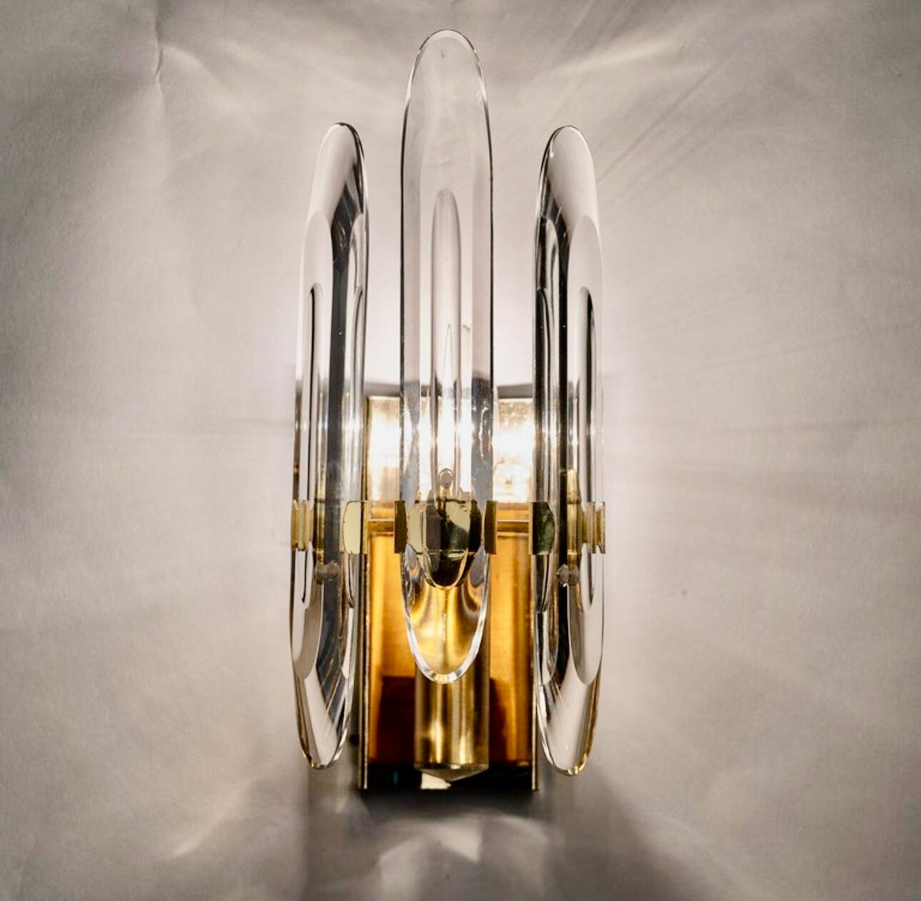 Pair of Sciolari sconces in glass and gilded brass. Italy 1970s