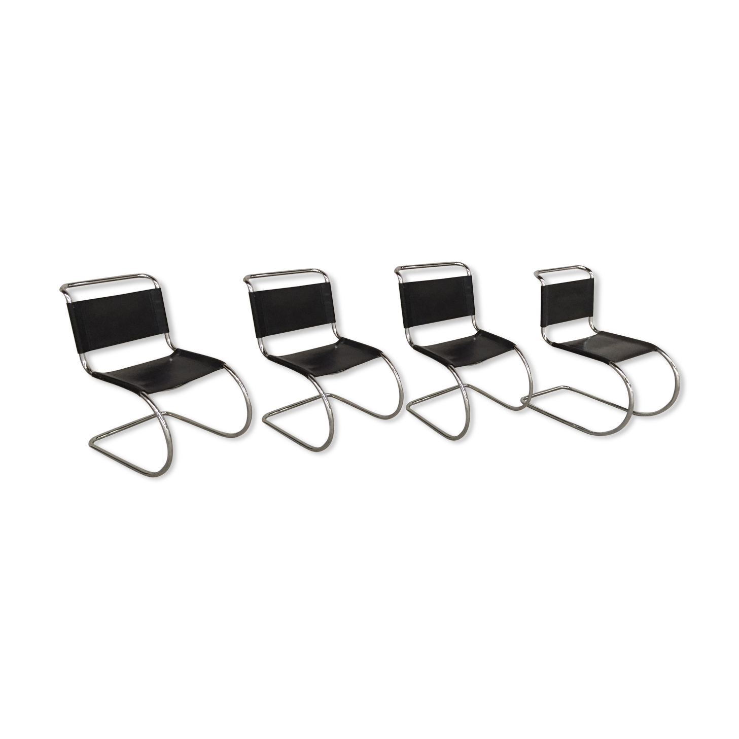 Set of 4 black leather chairs by Ludwig Mies Van Der Rohe