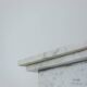 Pair of Art Deco style columns, in white marble, 20th century