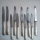 Set of 10 silver metal knives