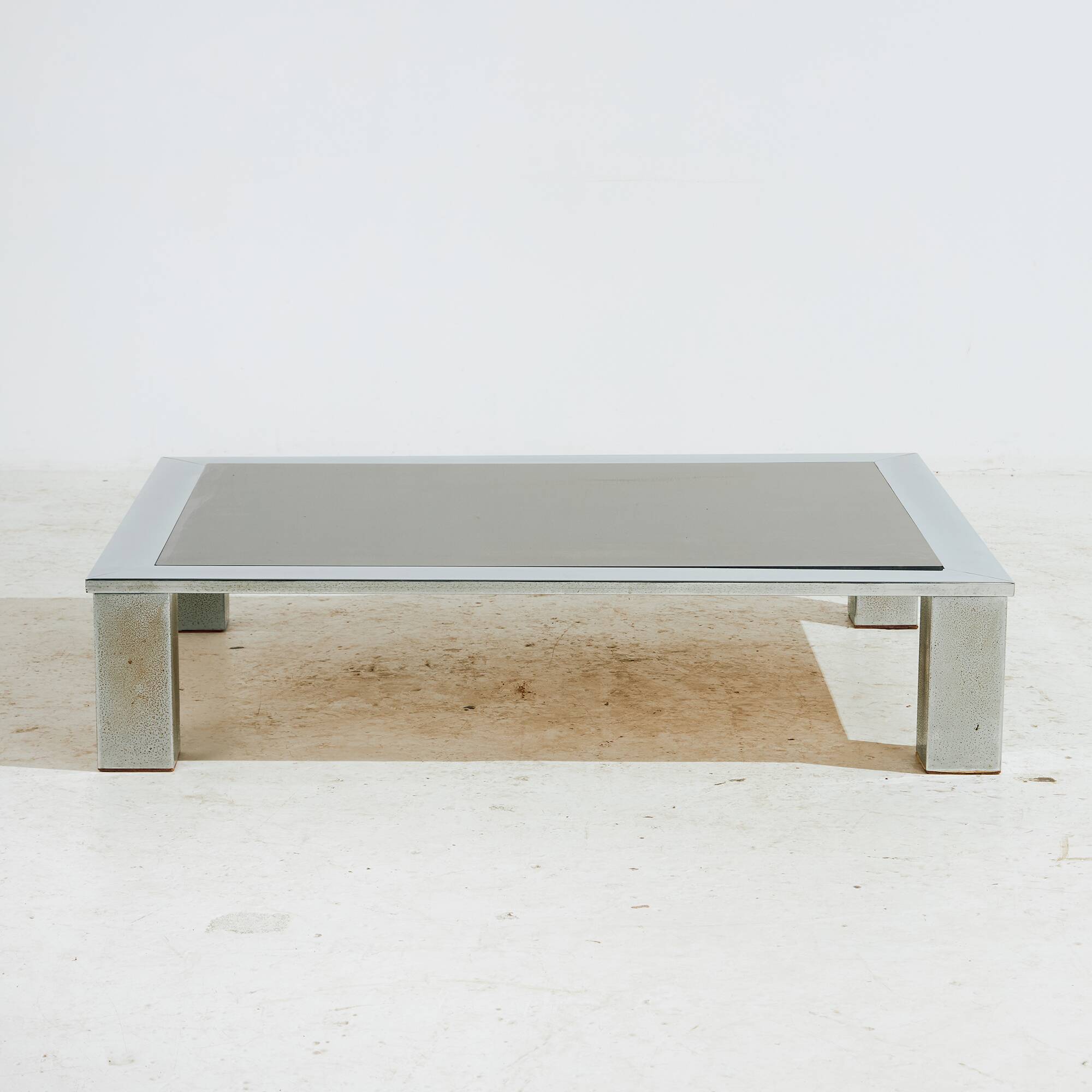 Chrome and glass coffee table.