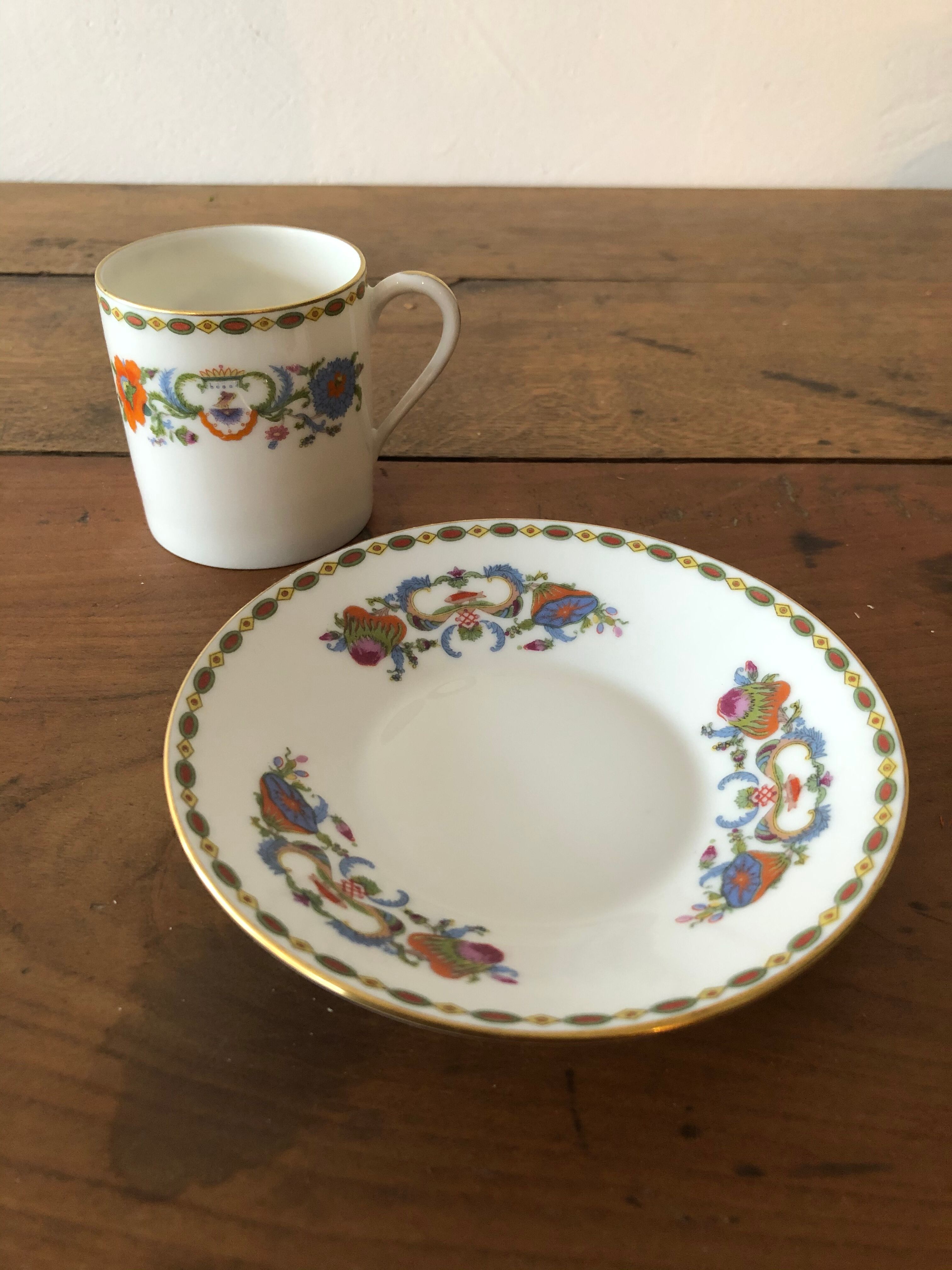 Service of 12 porcelain coffee cups, Raynaud, Limoges, 1950s.