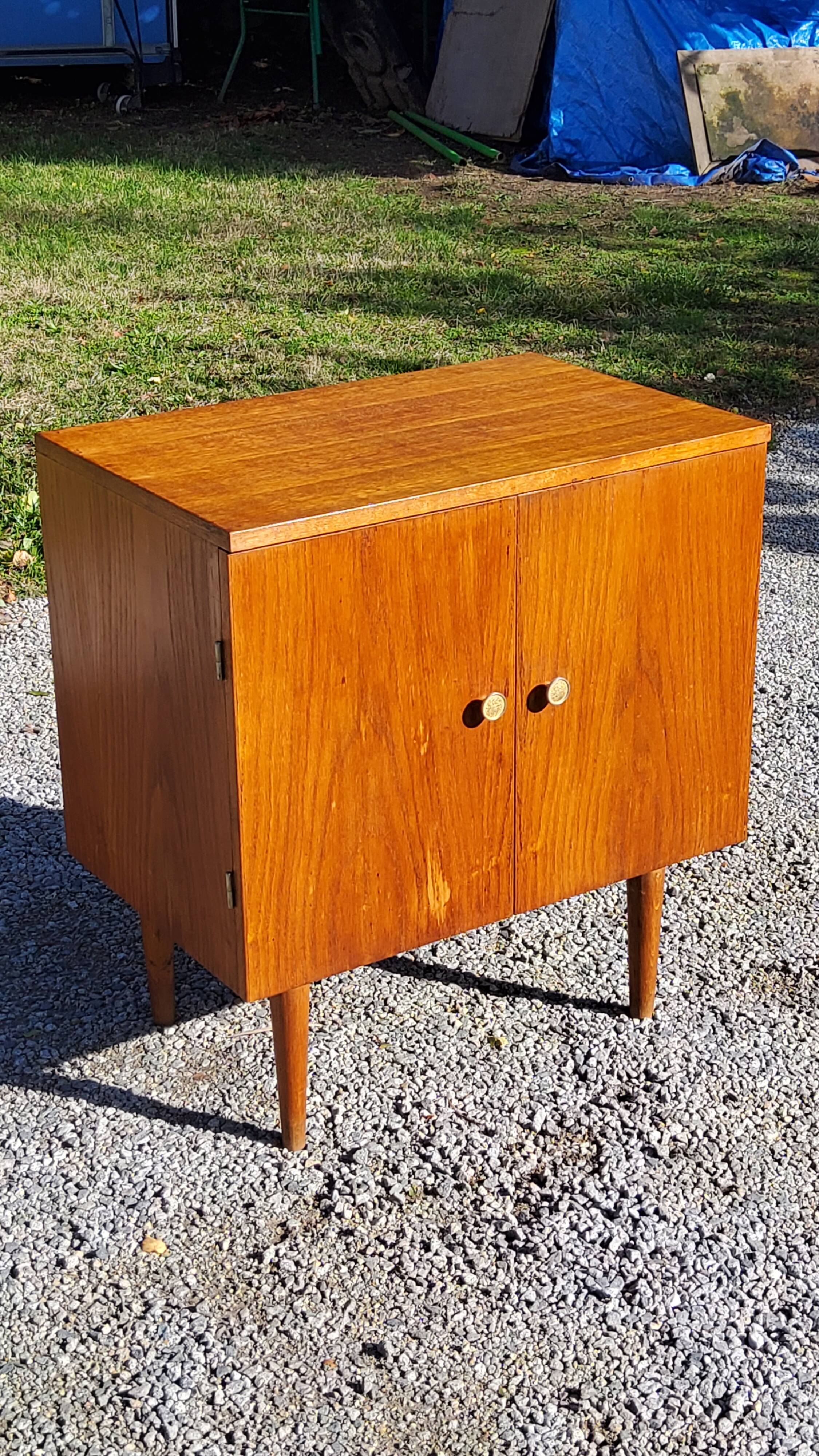 Vintage golden oak sideboard with conical legs from the 1950s