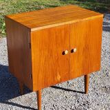 Vintage golden oak sideboard with conical legs from the 1950s
