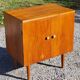Vintage golden oak sideboard with conical legs from the 1950s