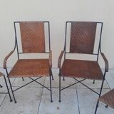 3 chaises et 2 fauteuils en fer forgé et rotin canné, années 50
